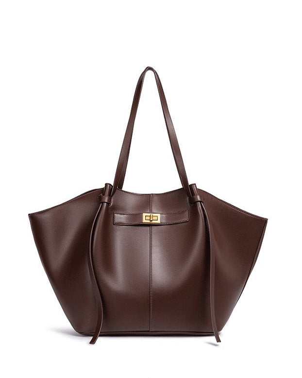 ARIA | Borsa Luxe Curve: l'accessorio che dice tutto
