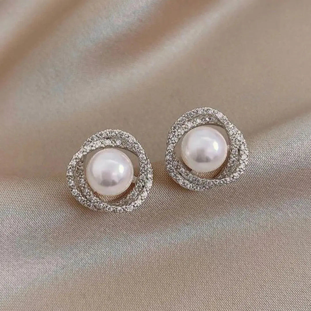Orecchini a spirale scintillanti con perle eleganti