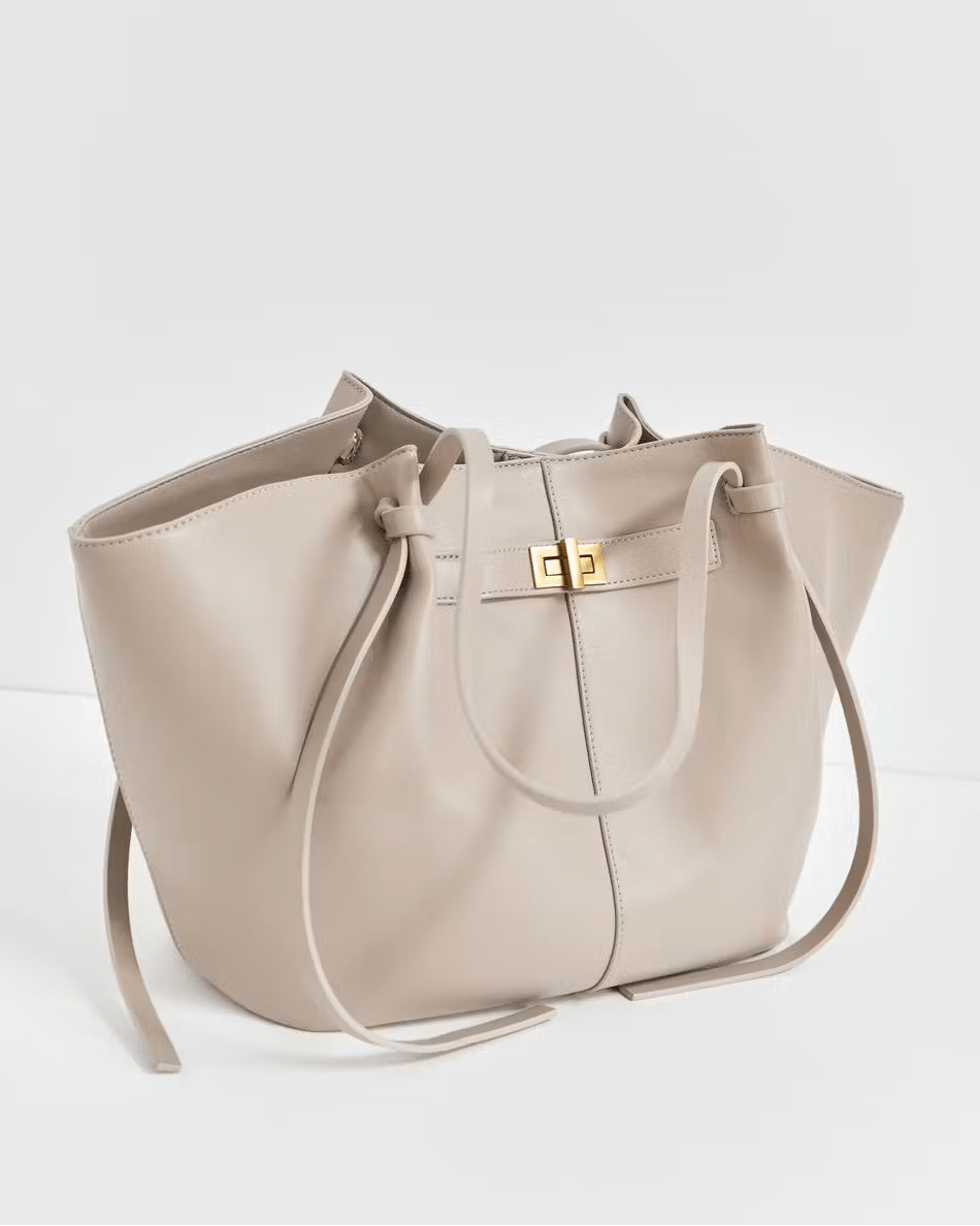 ARIA | Borsa Luxe Curve: l'accessorio che dice tutto